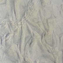 Patterns in the sand of the Huevil Beach